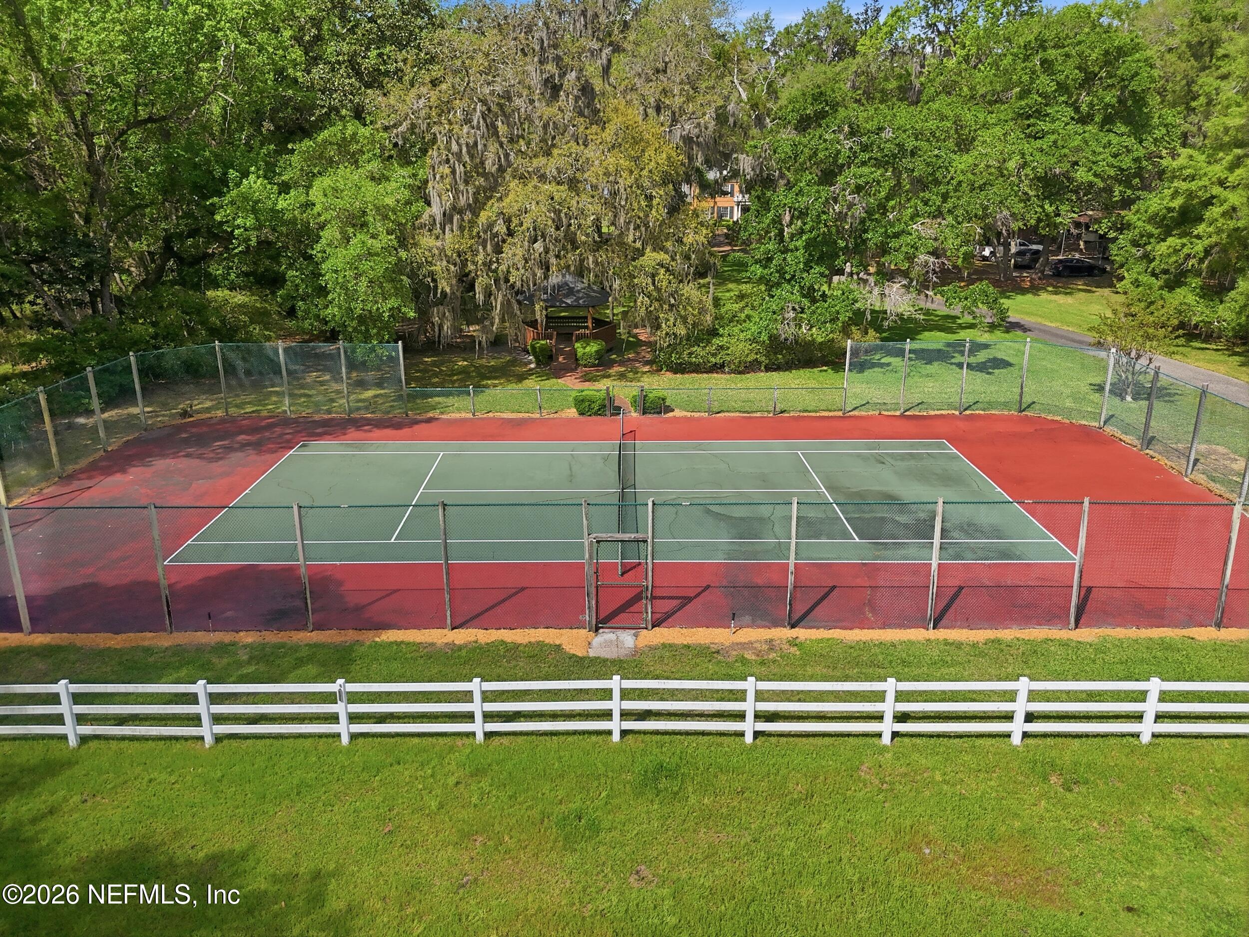 13200 Mandarin Road Jacksonville, FL 32223 - Photo 71 of 173 a view of a tennis ground with a big yard