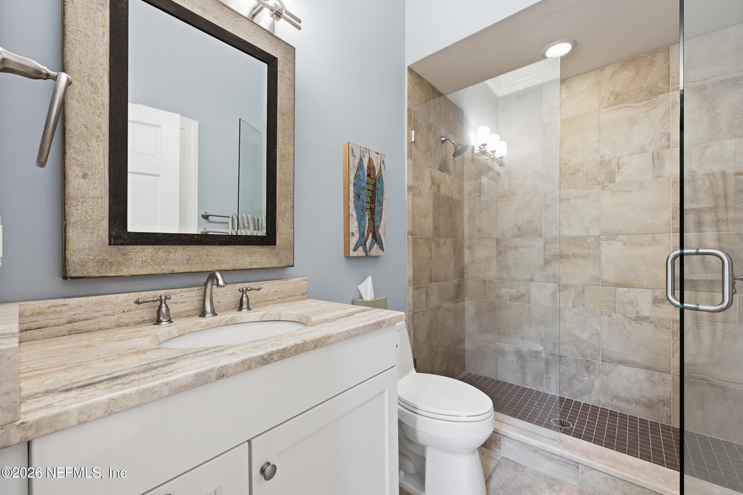 13200 Mandarin Road Jacksonville, FL 32223 - Photo 73 of 173 a bathroom with a sink a toilet and shower