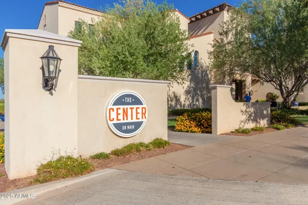 a view of street with a building in the background