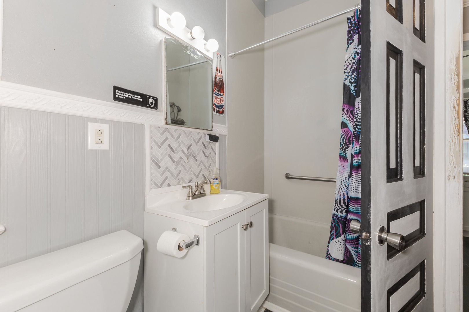 904 South Madison Street Bloomington, IL 61701 - Photo 23 of 46 a bathroom with a sink toilet and shower