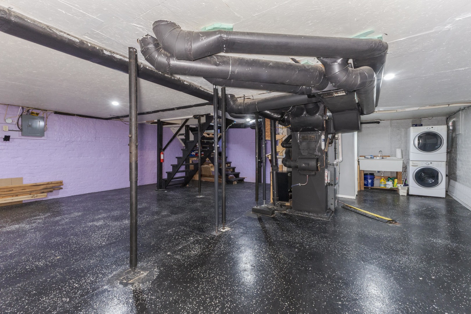 904 South Madison Street Bloomington, IL 61701 - Photo 33 of 46 a view of a room with gym equipment