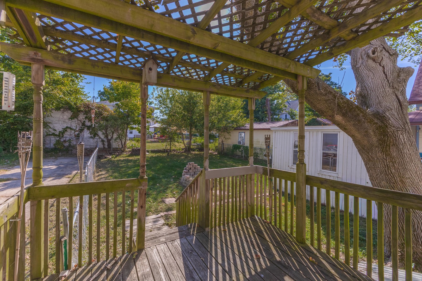 904 South Madison Street Bloomington, IL 61701 - Photo 46 of 46 a view of a balcony with a tree
