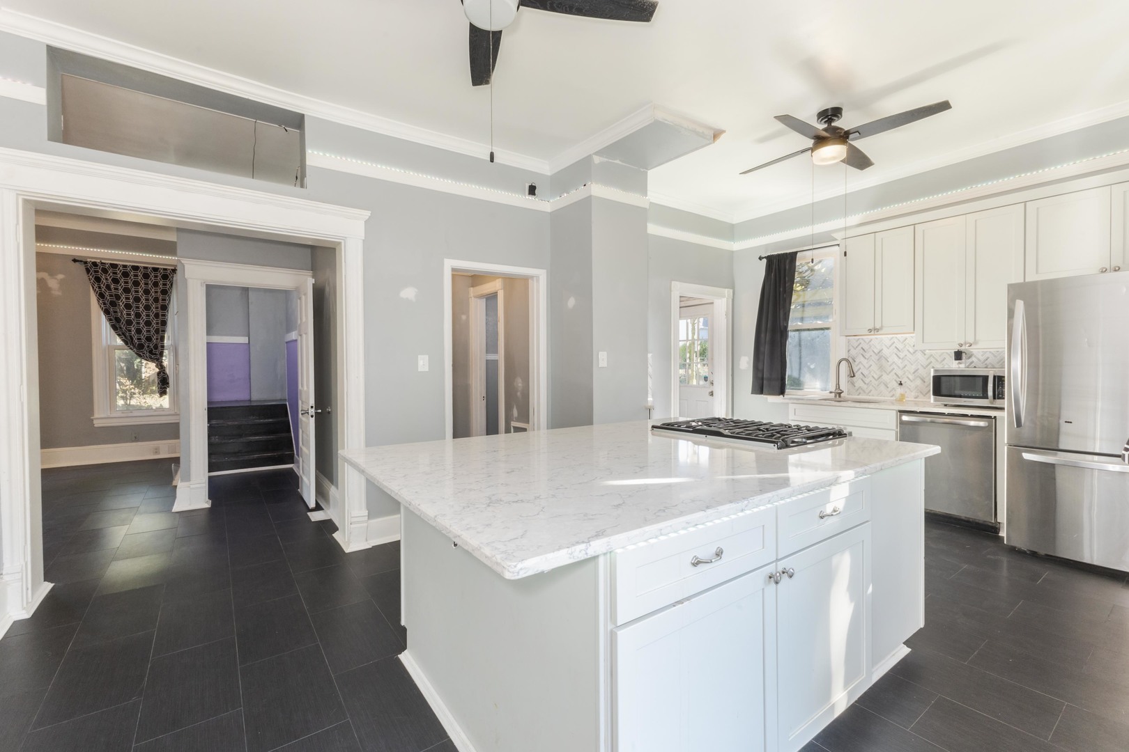 904 South Madison Street Bloomington, IL 61701 - Photo 9 of 46 a kitchen with a sink appliances and cabinets