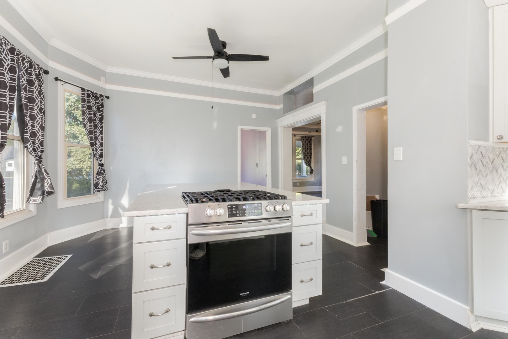 904 South Madison Street Bloomington, IL 61701 - Photo 10 of 46 a kitchen with a stove and a sink