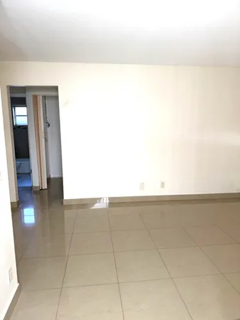 a view of a room with a bench
