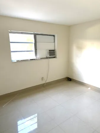 a view of a room that has a window