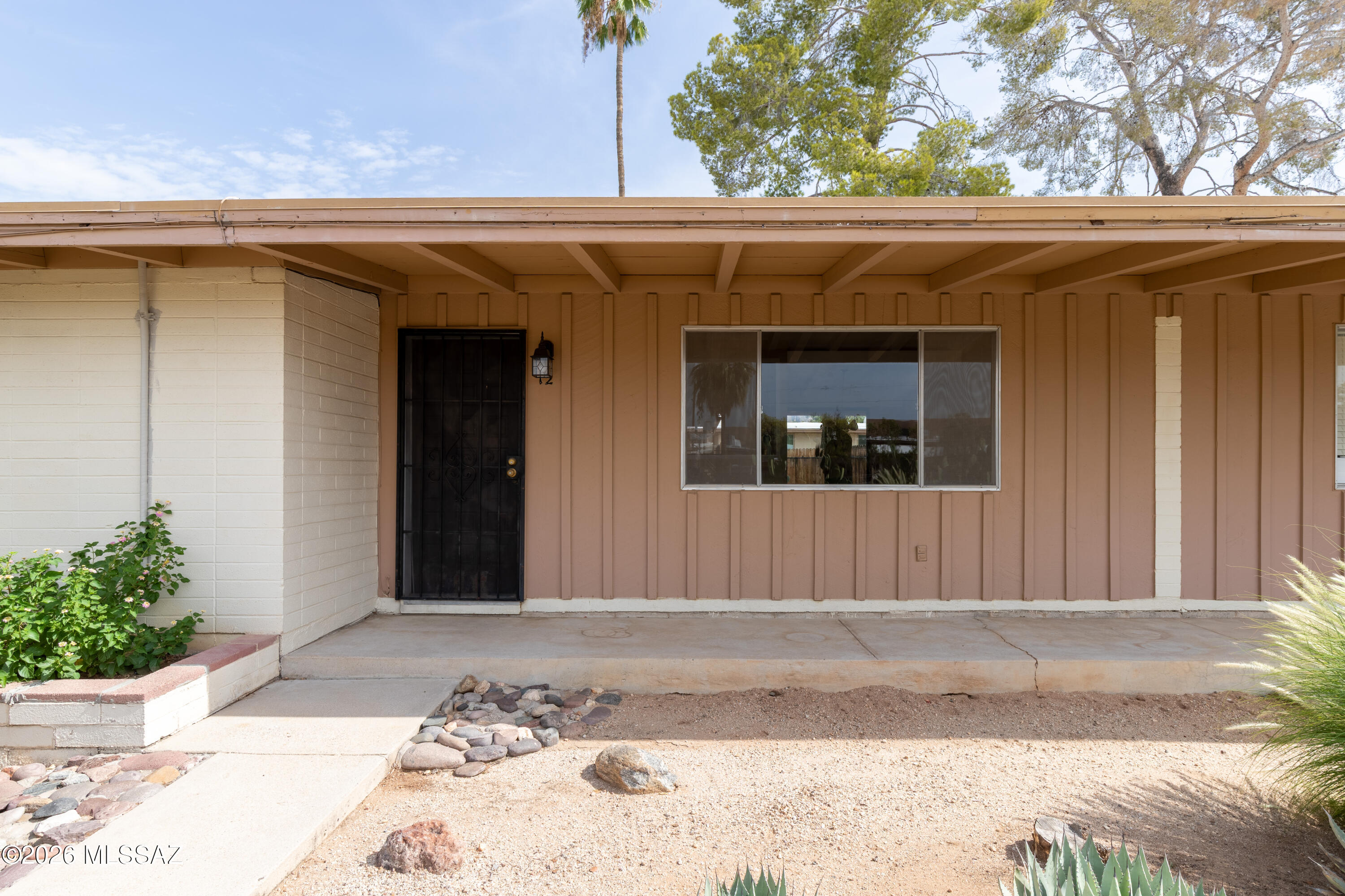 5901 North Oracle Road, Unit 12 Tucson, AZ 85704 - Photo 14 of 29 The iron screen door is a nice tough.