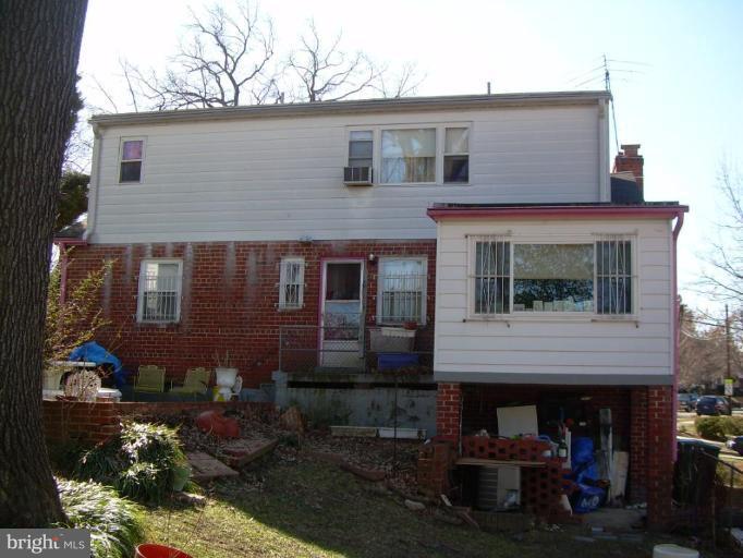 78 Rittenhouse Street Northeast Washington, DC 20011 - Photo 2 of 7 a front view of a house with plants