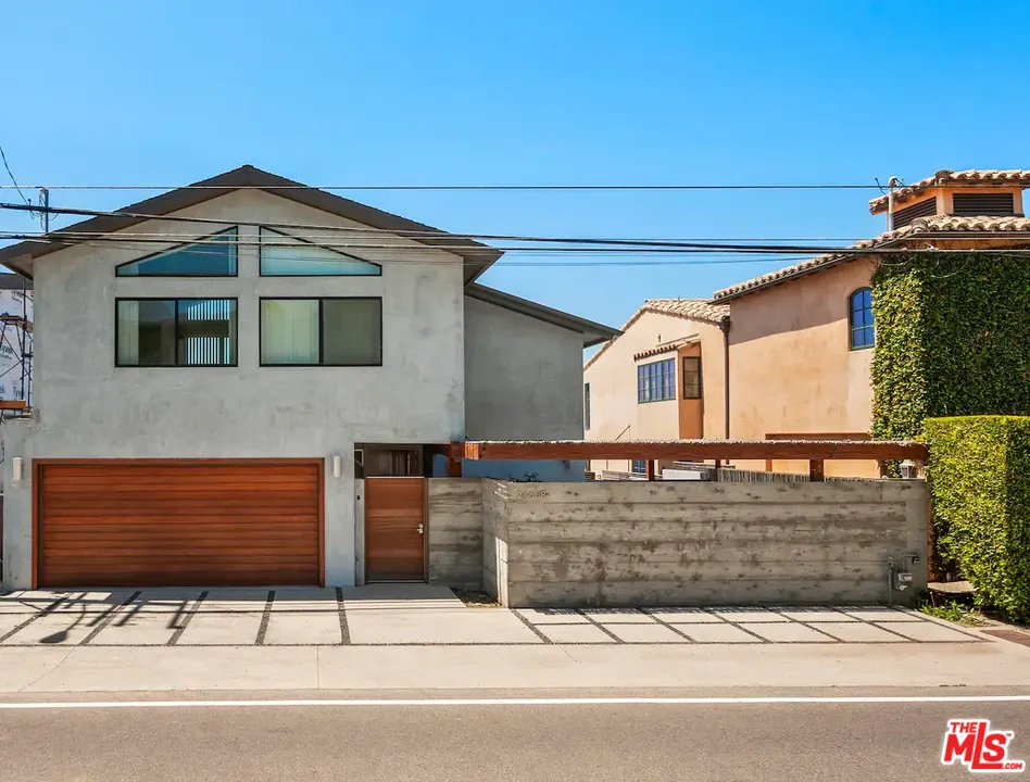 24608 Malibu Road Malibu, CA 90265 - Photo 28 of 30 a front view of a house with garage