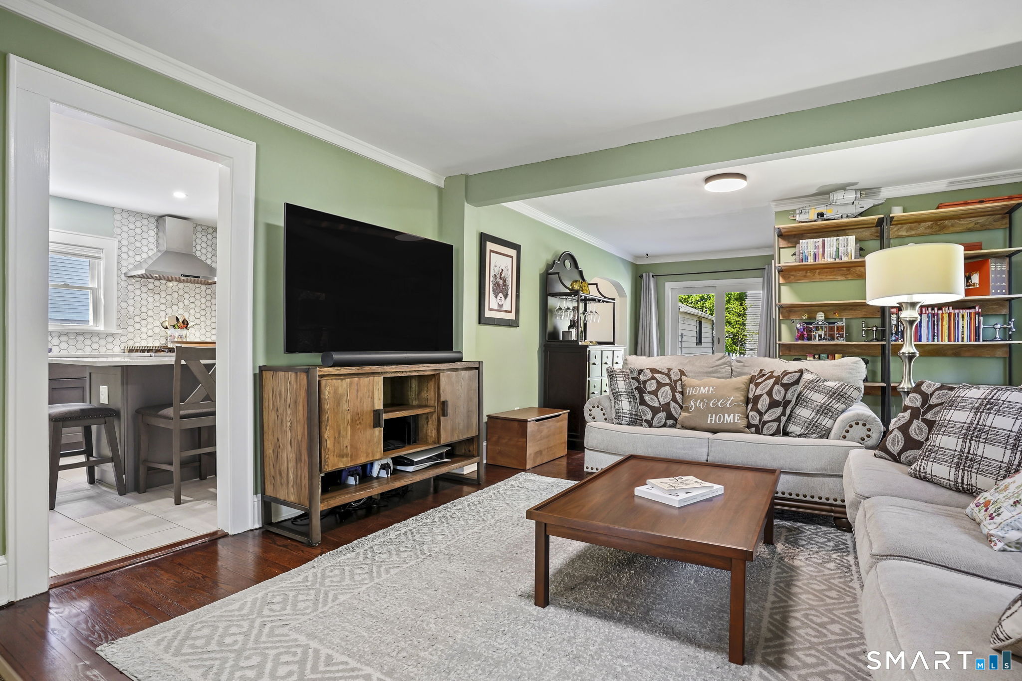 315 Church Hill Road Trumbull, CT 06611 - Photo 11 of 40 a living room with furniture and a flat screen tv