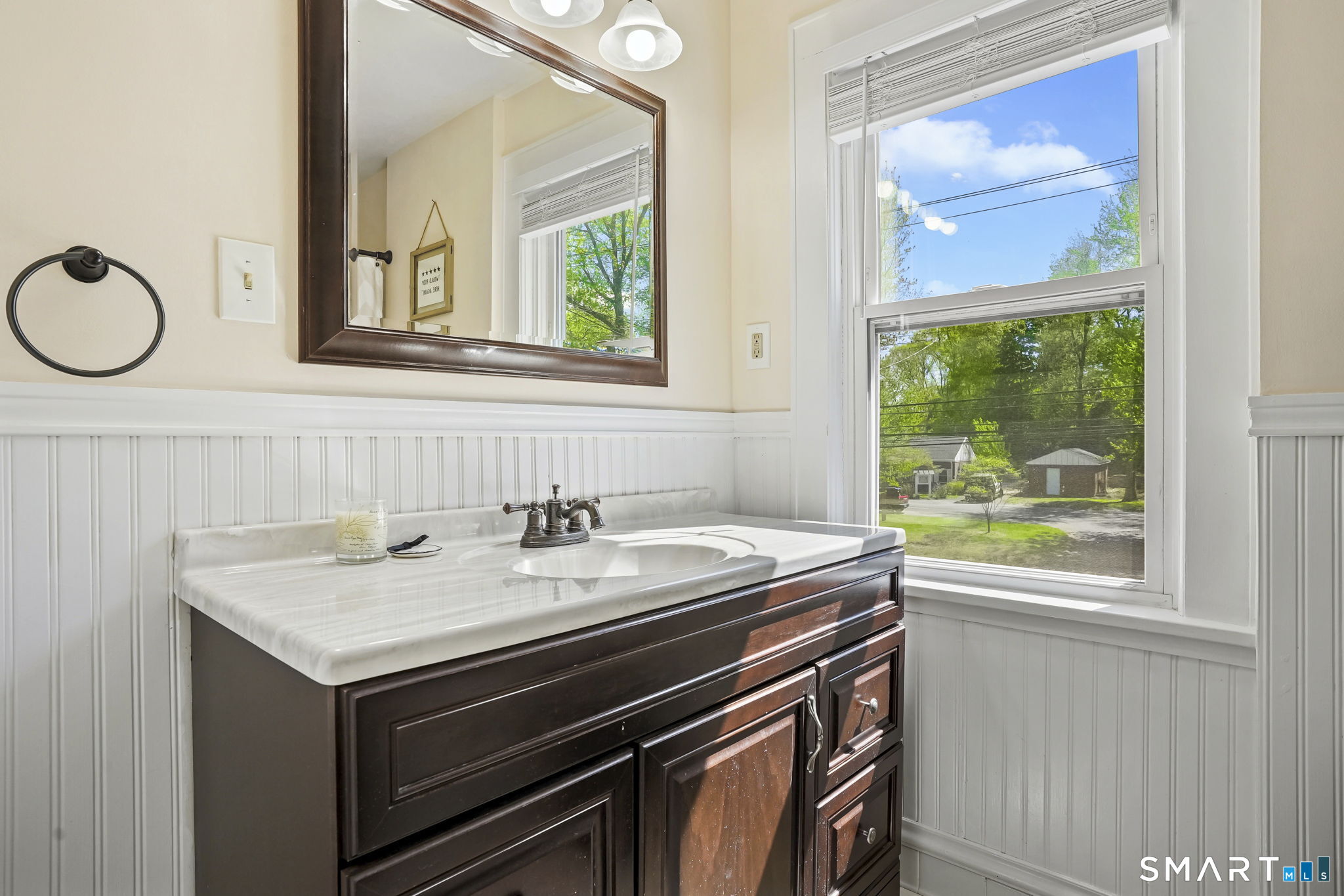 315 Church Hill Road Trumbull, CT 06611 - Photo 25 of 40 a bathroom with a sink and a mirror