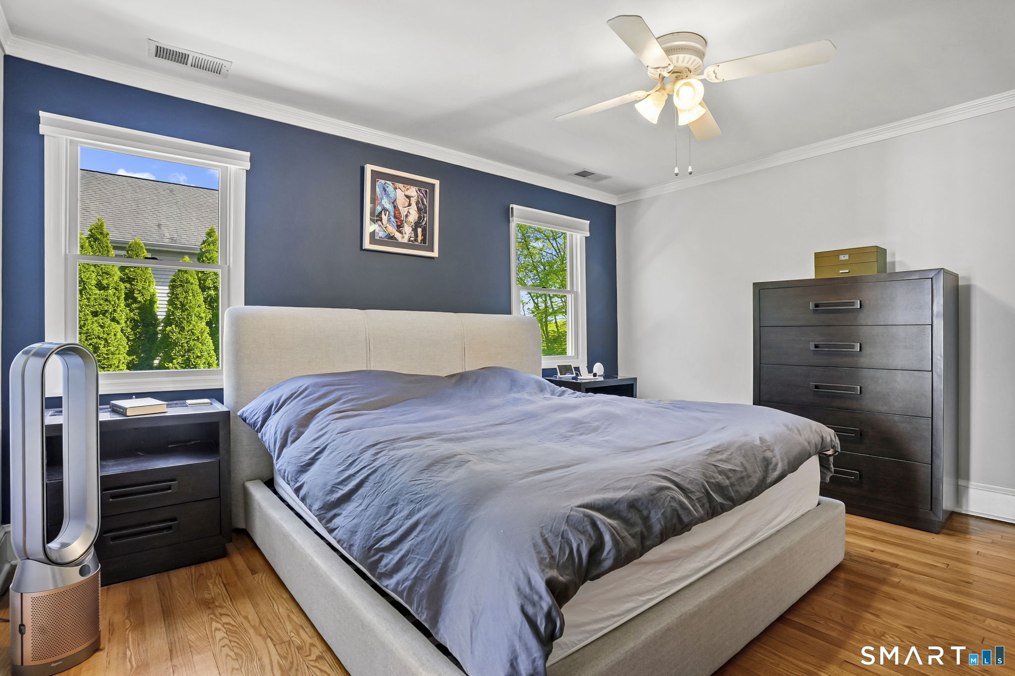 315 Church Hill Road Trumbull, CT 06611 - Photo 32 of 40 a bedroom with a bed and a chandelier