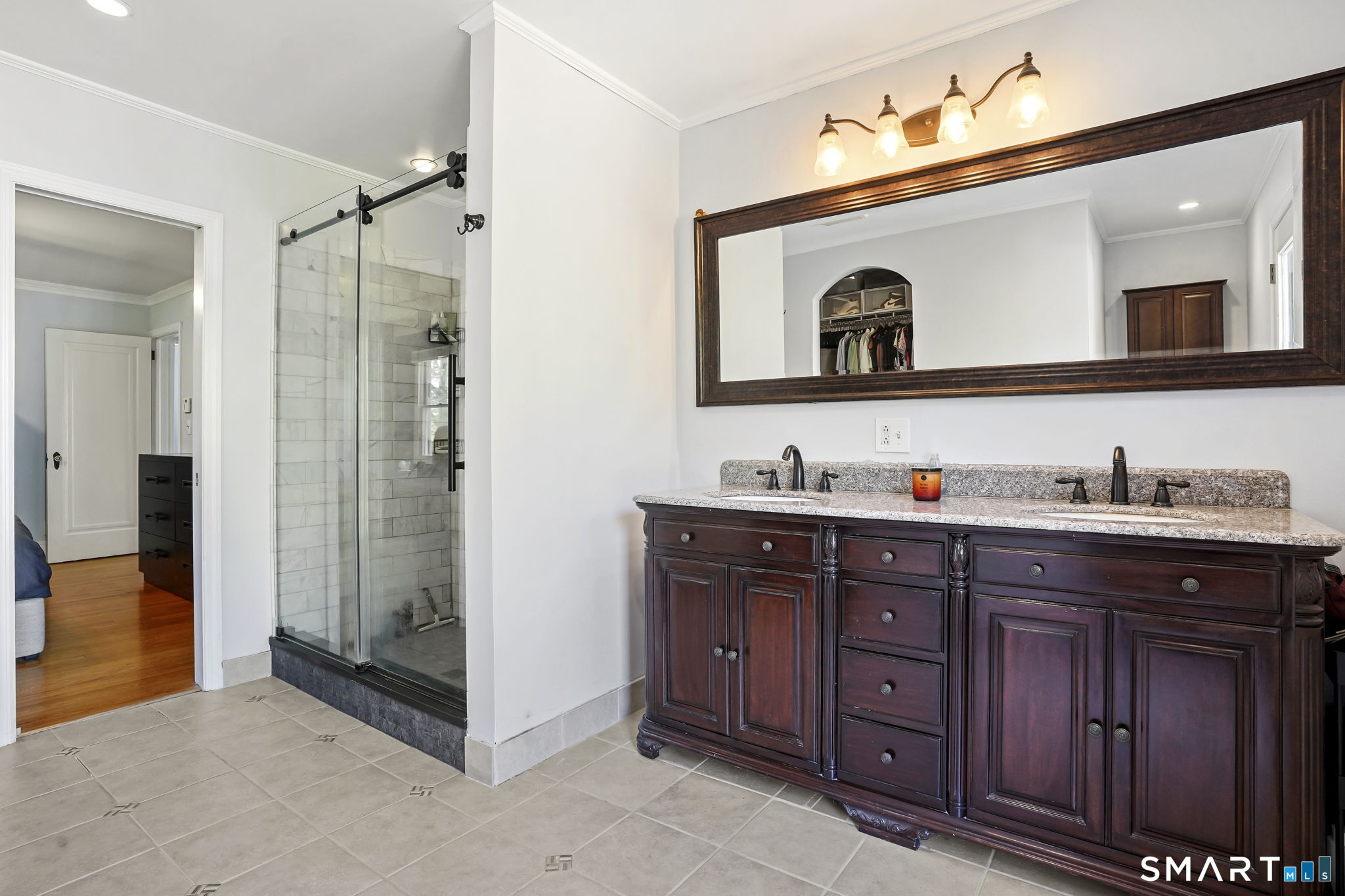 315 Church Hill Road Trumbull, CT 06611 - Photo 35 of 40 a bathroom with a sink and a mirror