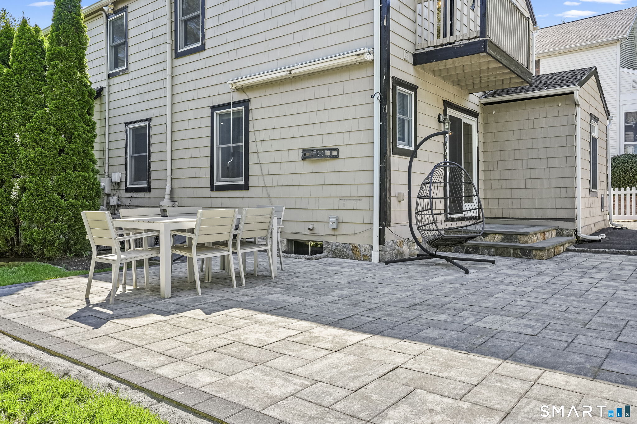 315 Church Hill Road Trumbull, CT 06611 - Photo 38 of 40 a backyard of a house with barbeque oven table and chairs