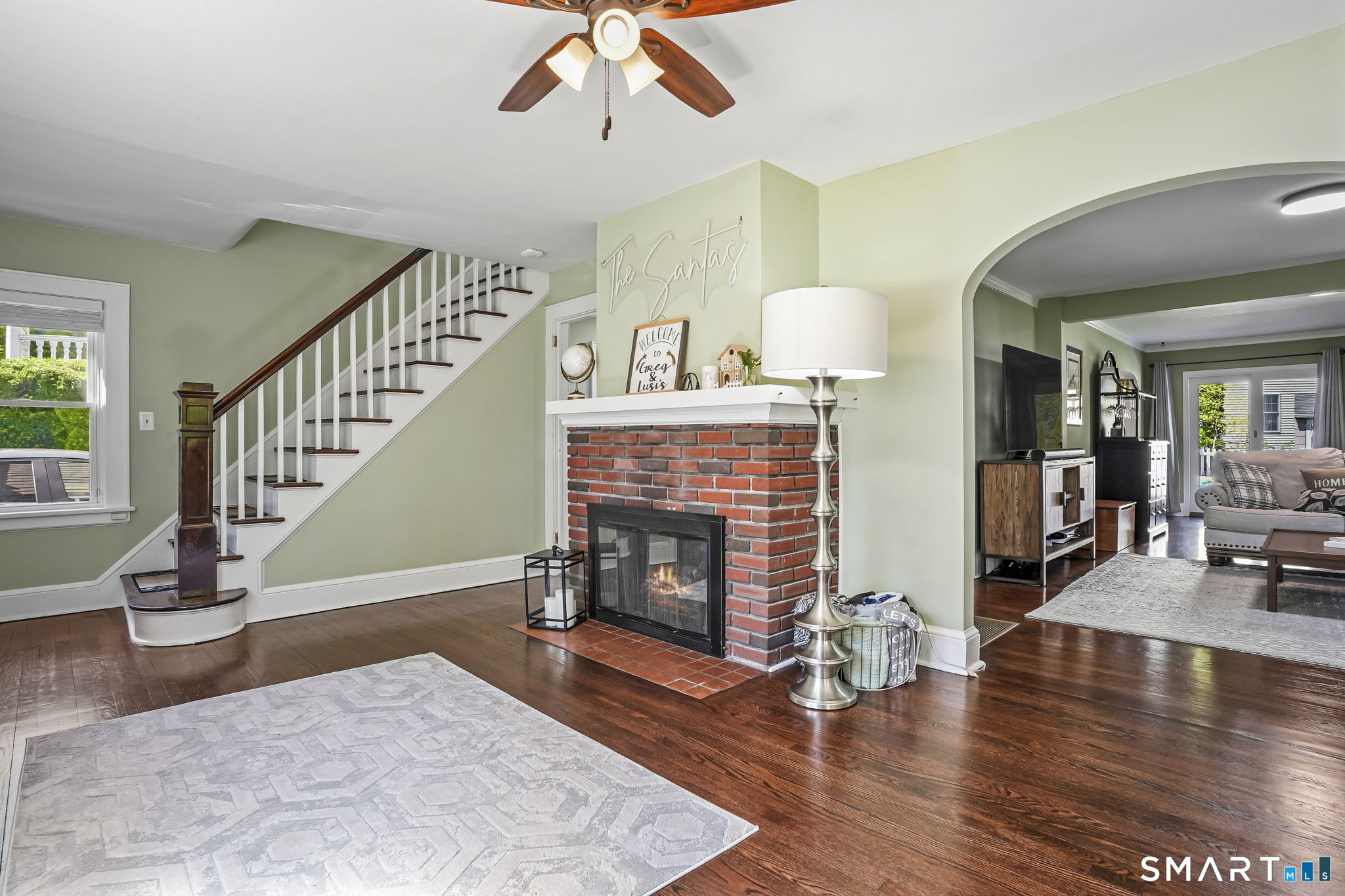 315 Church Hill Road Trumbull, CT 06611 - Photo 7 of 40 a living room with fireplace furniture and a wooden floor