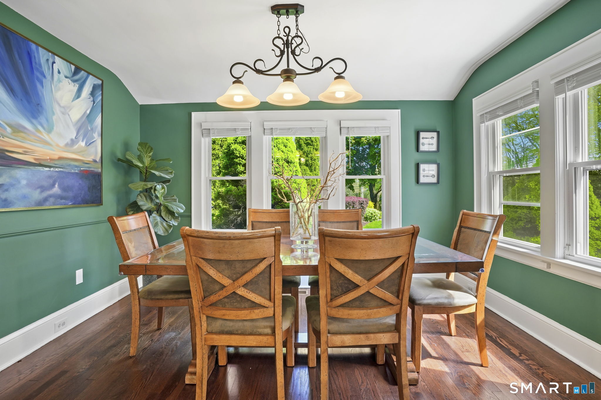 315 Church Hill Road Trumbull, CT 06611 - Photo 9 of 40 a view of a dining room with furniture large window and wooden floor