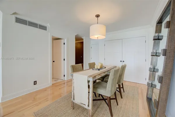 a view of a dining room with furniture