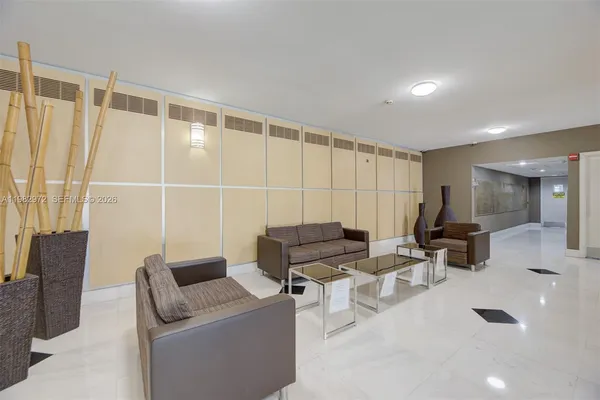 a living room with furniture and a window