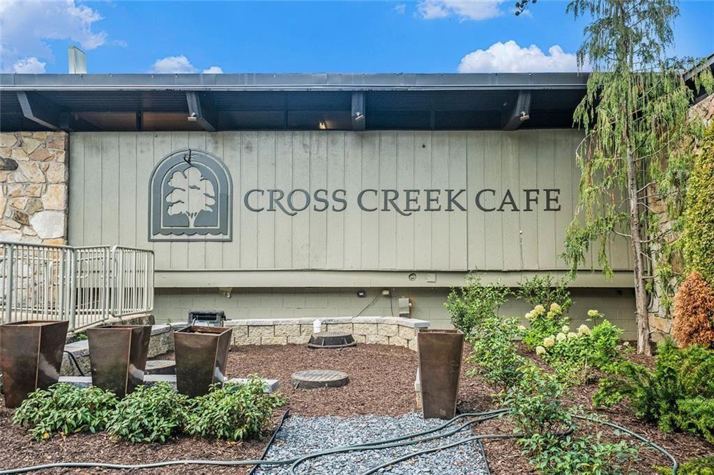 94 Rosaire Place Northwest Atlanta, GA 30327 - Photo 17 of 21 a front view of a house with plants