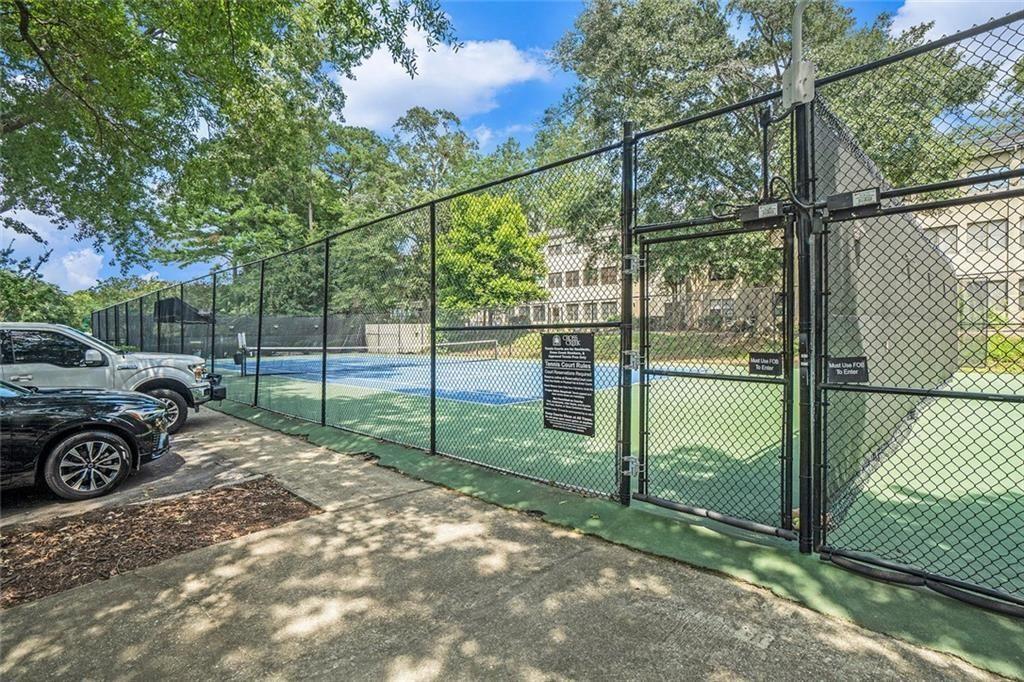 94 Rosaire Place Northwest Atlanta, GA 30327 - Photo 18 of 21 a view of a backyard