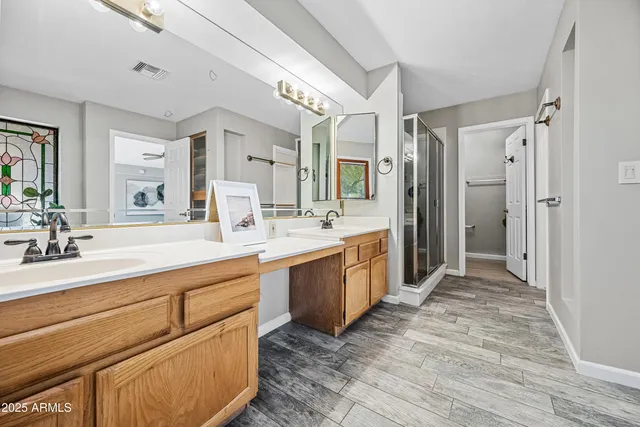 a bathroom with a tub and a shower