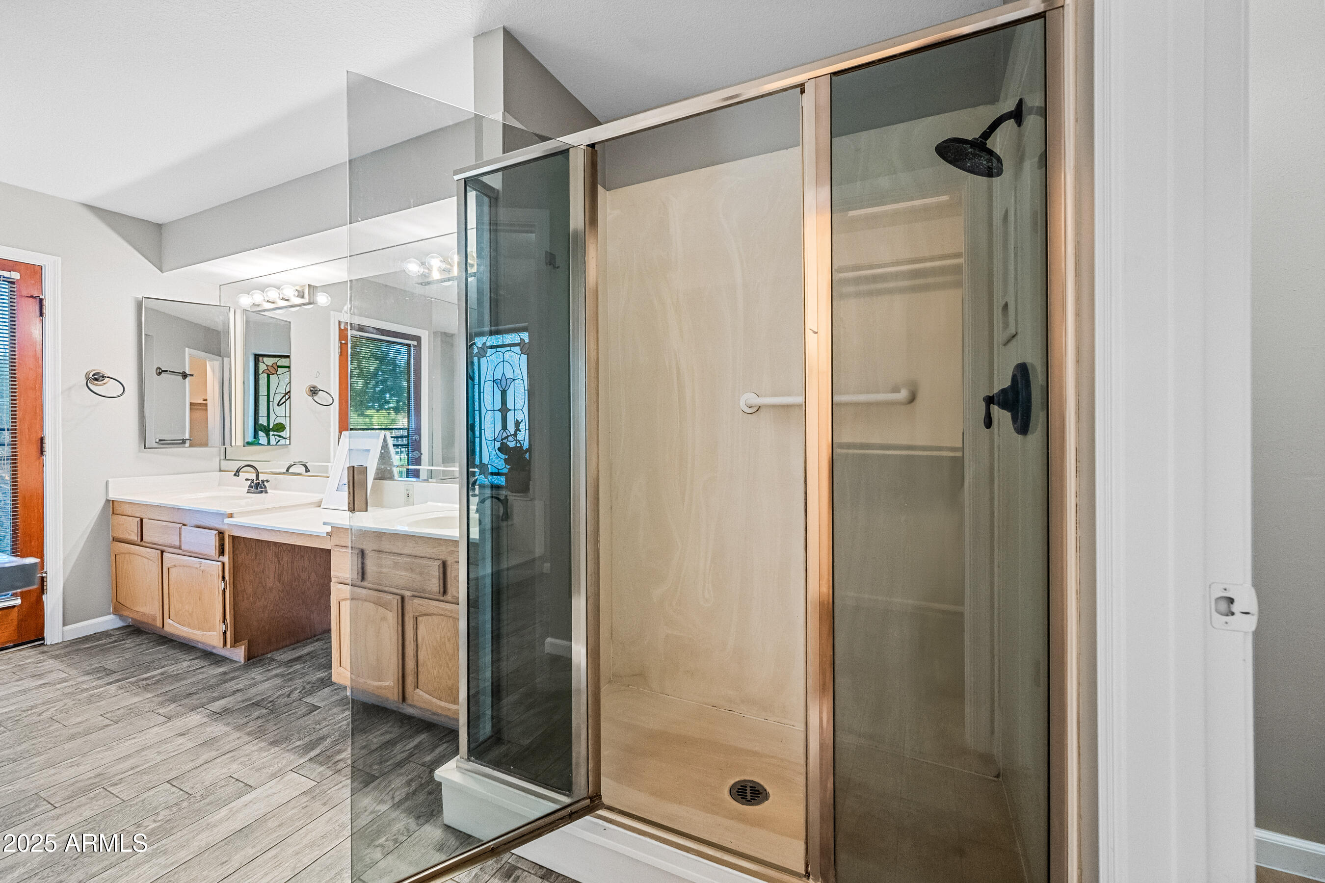 5751 West Del Rio Street Chandler, AZ 85226 - Photo 24 of 44 a bathroom with a granite countertop shower mirror and a sink