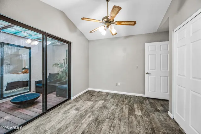 a view of a livingroom with wooden floor