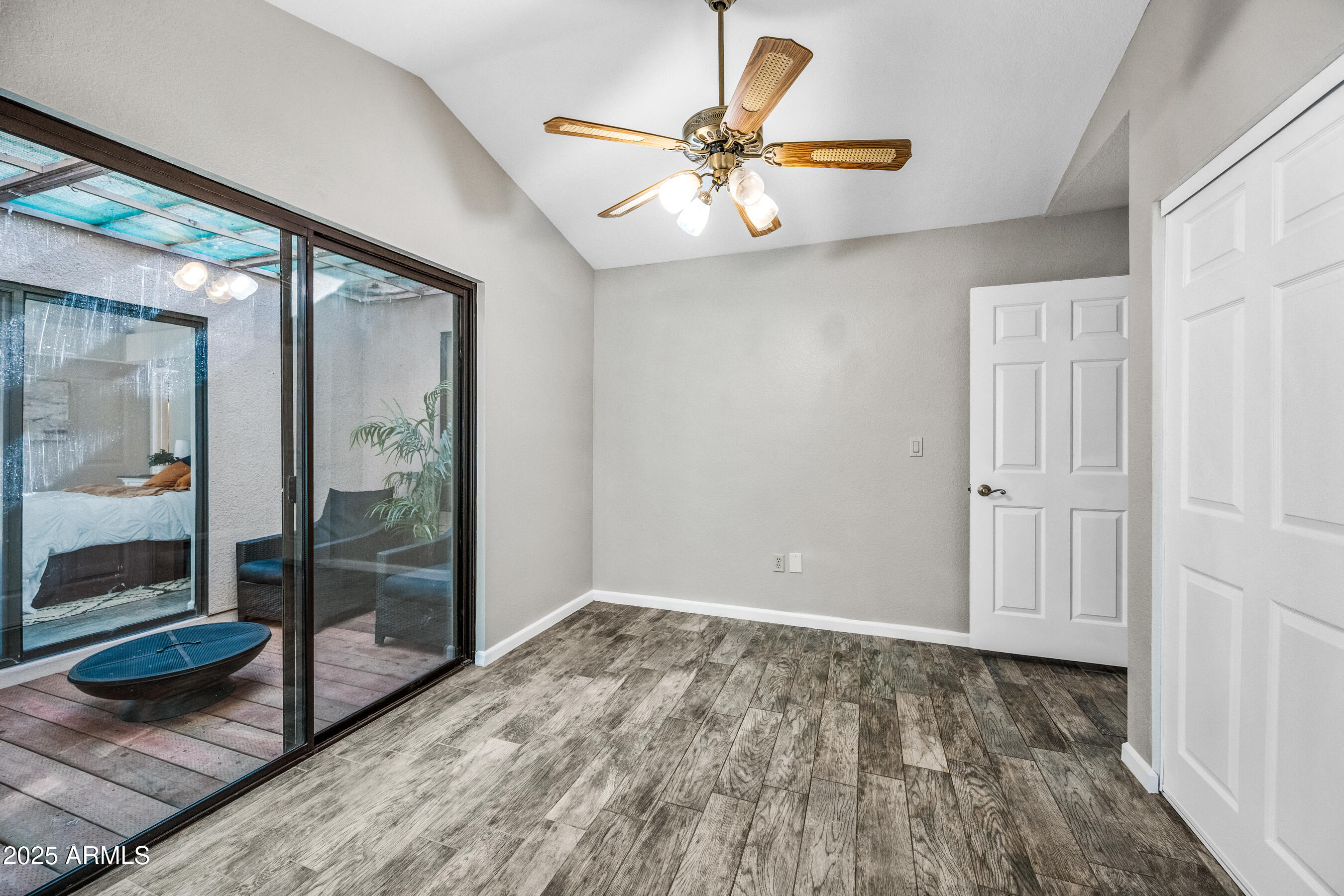 5751 West Del Rio Street Chandler, AZ 85226 - Photo 27 of 44 a view of an empty room and glass door