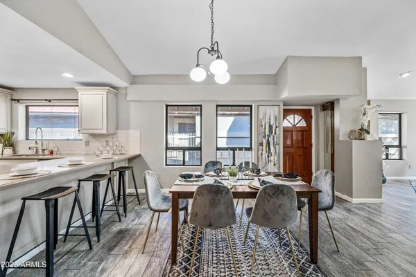 a view of a dining room with furniture