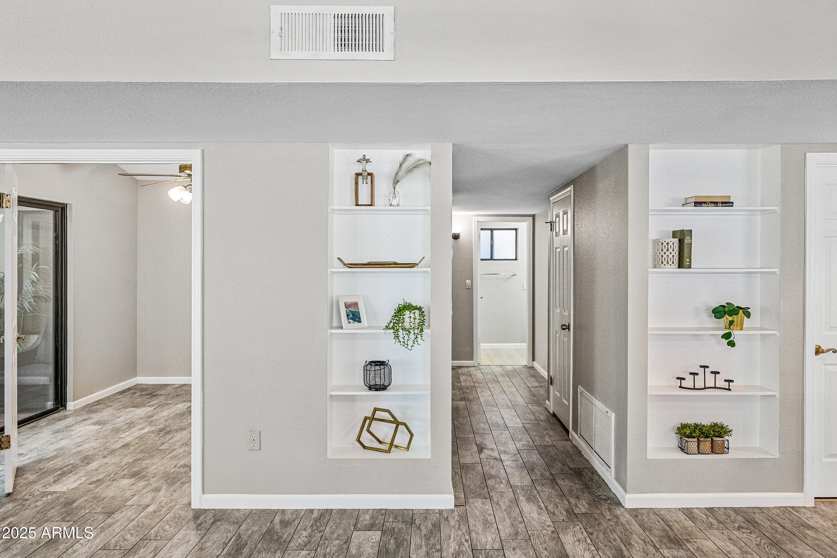 5751 West Del Rio Street Chandler, AZ 85226 - Photo 37 of 44 a view of an entryway with wooden floor
