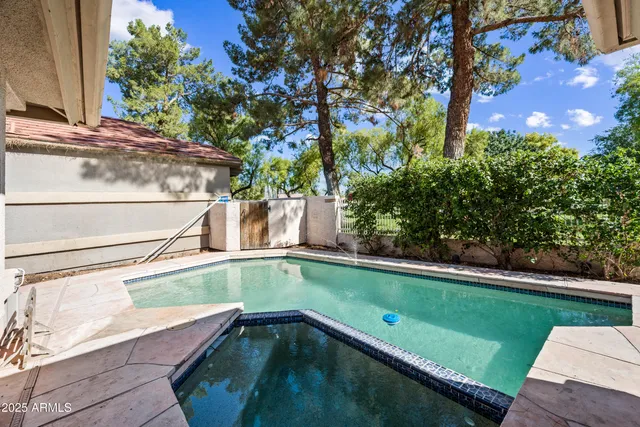 a view of a house with a yard porch and sitting area