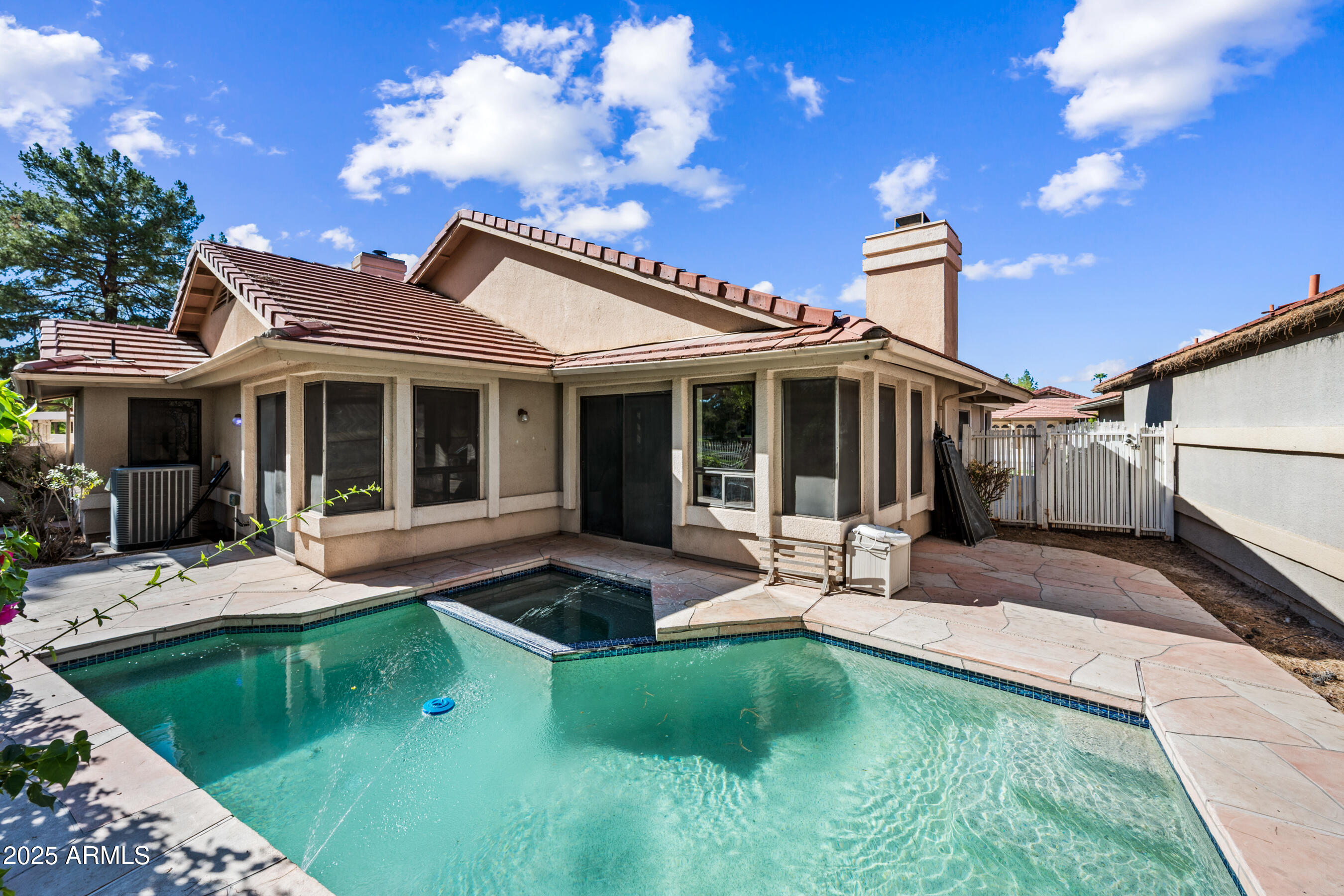 5751 West Del Rio Street Chandler, AZ 85226 - Photo 43 of 44 a view of a house with a yard porch and sitting area