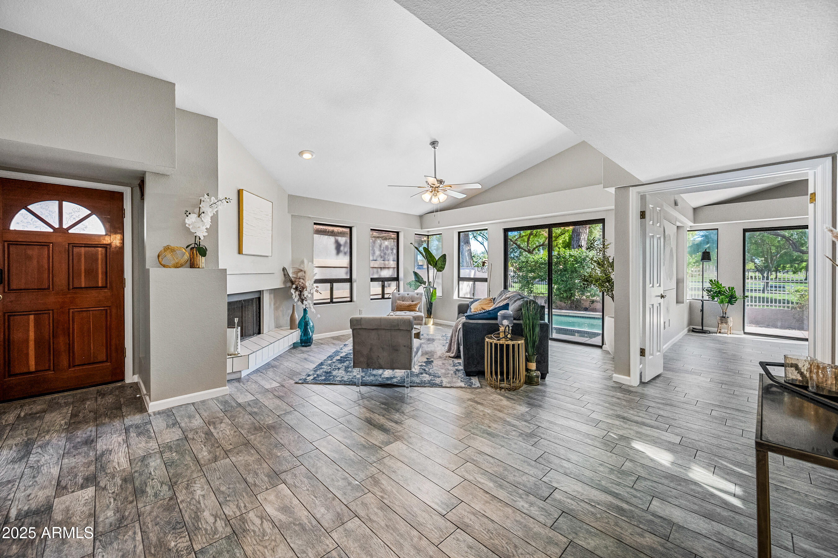 5751 West Del Rio Street Chandler, AZ 85226 - Photo 7 of 44 a living room with furniture and a wooden floor