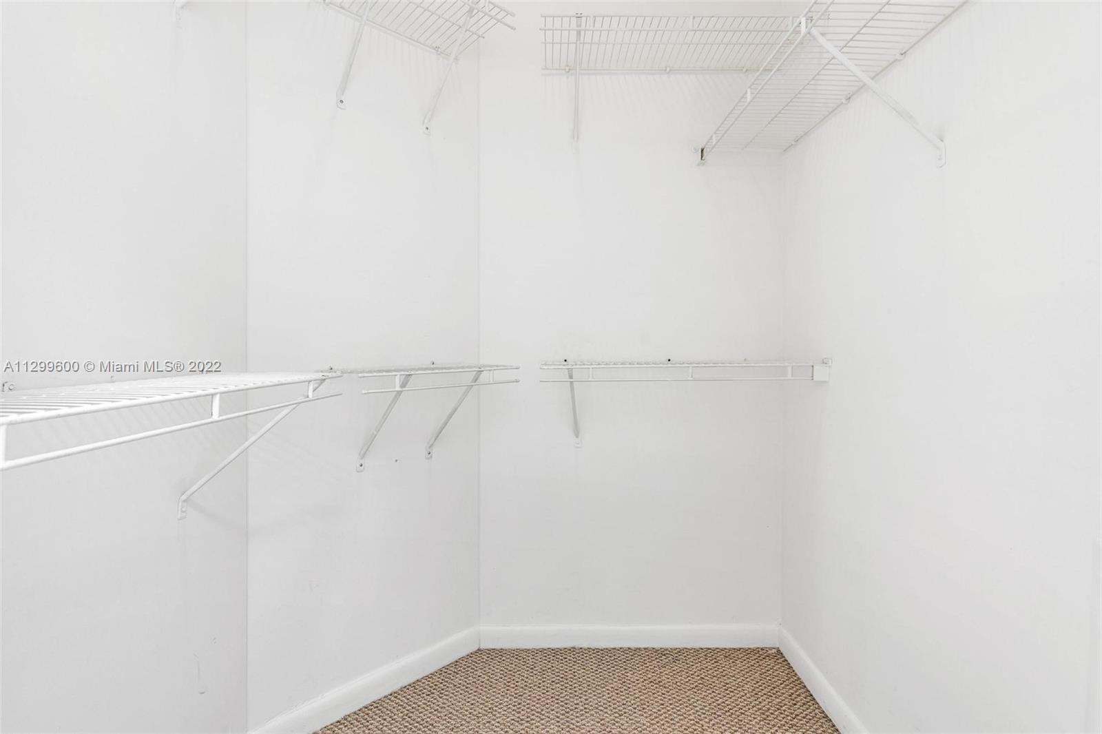 2001 Biscayne Boulevard, Unit 2308 Miami, FL 33137 - Photo 12 of 17 a view of a room with racks on the wall