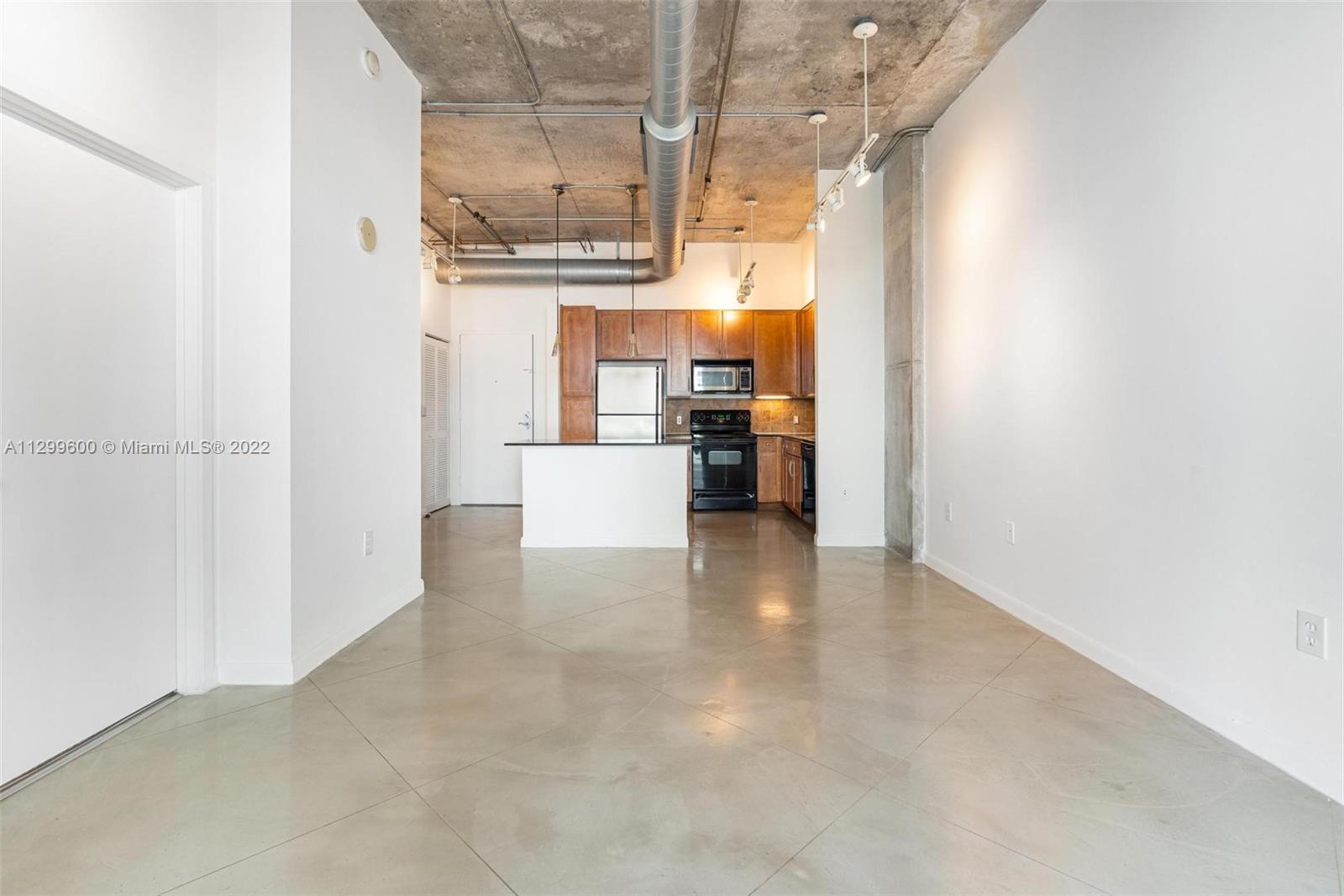 2001 Biscayne Boulevard, Unit 2308 Miami, FL 33137 - Photo 6 of 17 a view of a kitchen and a window