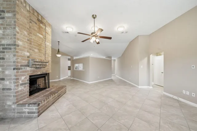 a kitchen with stainless steel appliances refrigerator and microwave