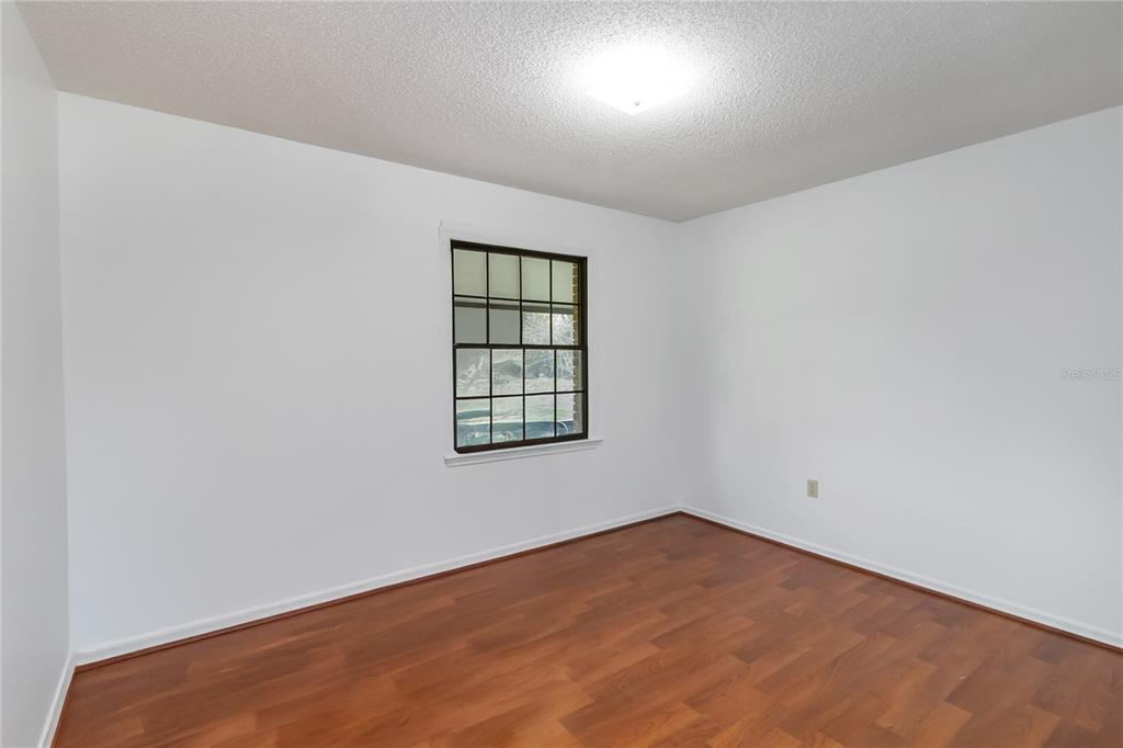 4207 Hamilton Court St. Cloud, FL 34769 - Photo 16 of 30 an empty room with a window