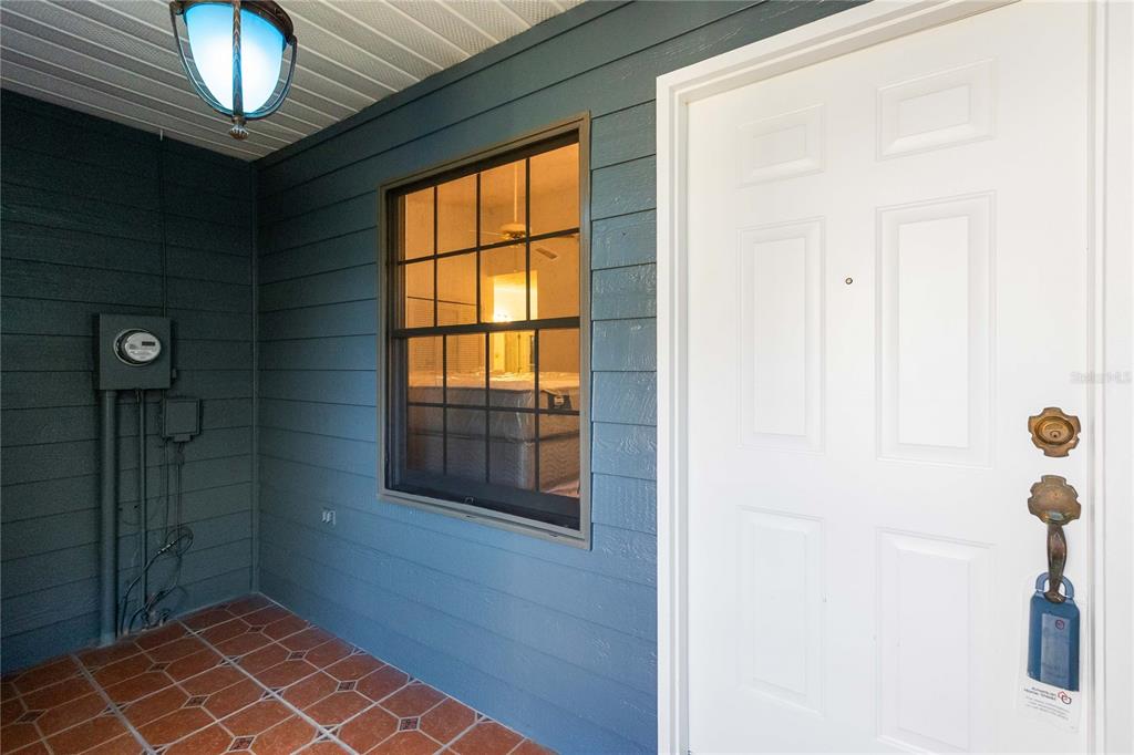 4207 Hamilton Court St. Cloud, FL 34769 - Photo 3 of 30 a view of an empty room with window and chandelier fan