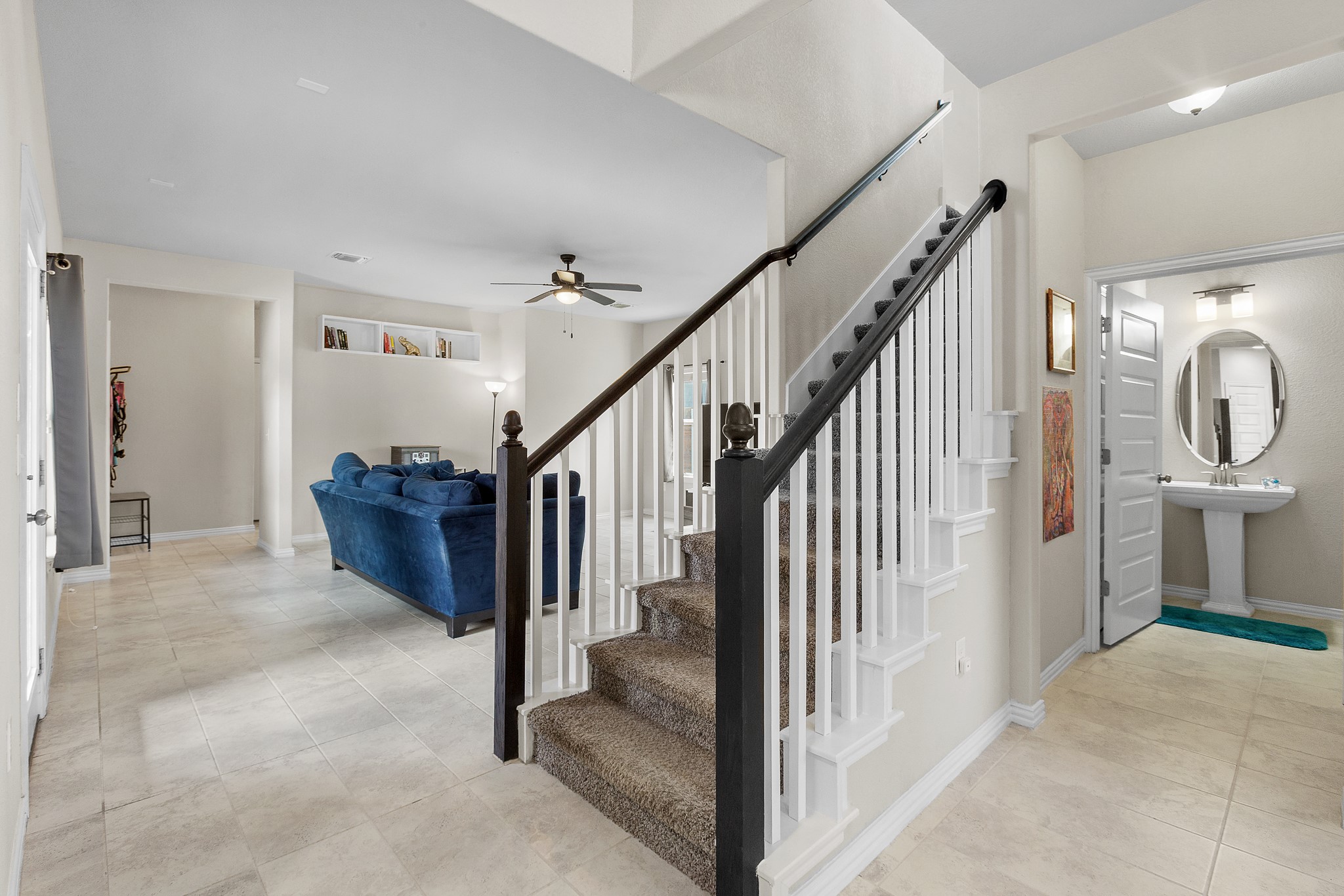 8709 Slater Drive Austin, TX 78747 - Photo 10 of 36 a view of an entryway with staircase