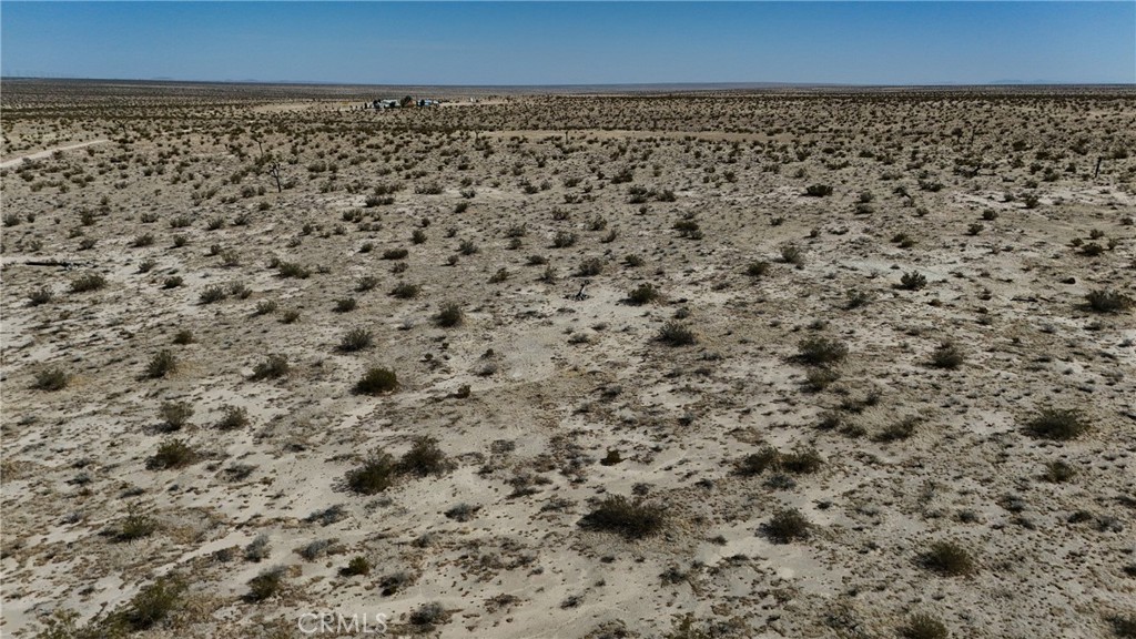 745 White Bird Road Adelanto, CA 92301 - Photo 4 of 10 Red boundary lines on pictures are an estimate and for marketing purposes only. Buyer to verify all aspects of this property including, but not limited to utilities, assessments, boundaries, usage, access, and zoning to satisfy themselves.