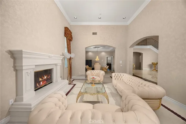 a view of a dining room with furniture large windows and wooden floor