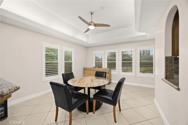 a bathroom with a granite countertop sink mirror and shower
