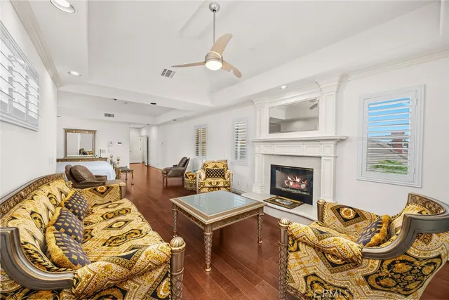 a bedroom with a bed chair and a window