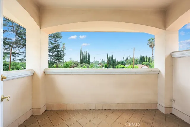 a house view with a garden space