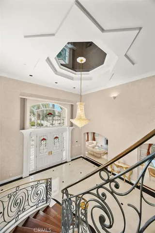 a view of a backyard with plants and a garden