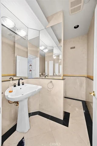 an aerial view of a house with a swimming pool outdoor seating and yard