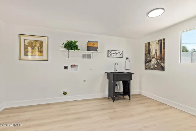 a view of a livingroom with shelves