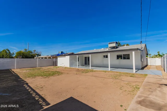 a view of a house with a large window