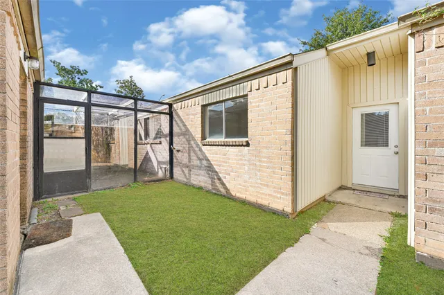 a view of a porch with a yard