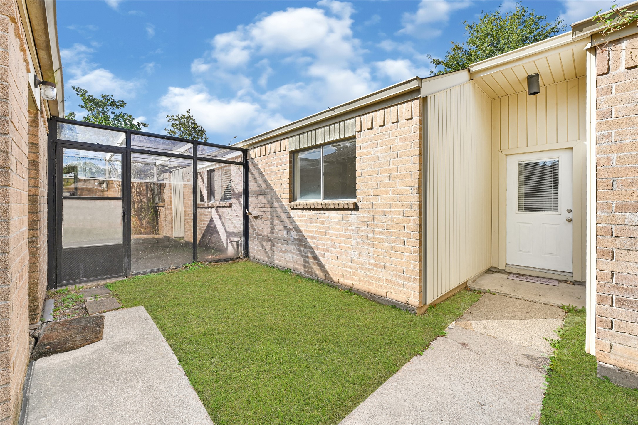 18562 Meadows Way Drive Houston, TX 77084 - Photo 4 of 11 a view of a porch with a yard